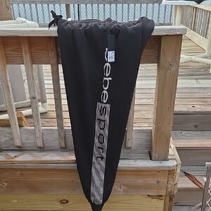 Bebe Banded Cuff Sweatpaints Silver Glitter Writing